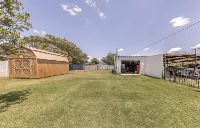 a bathroom with a sink and a large window