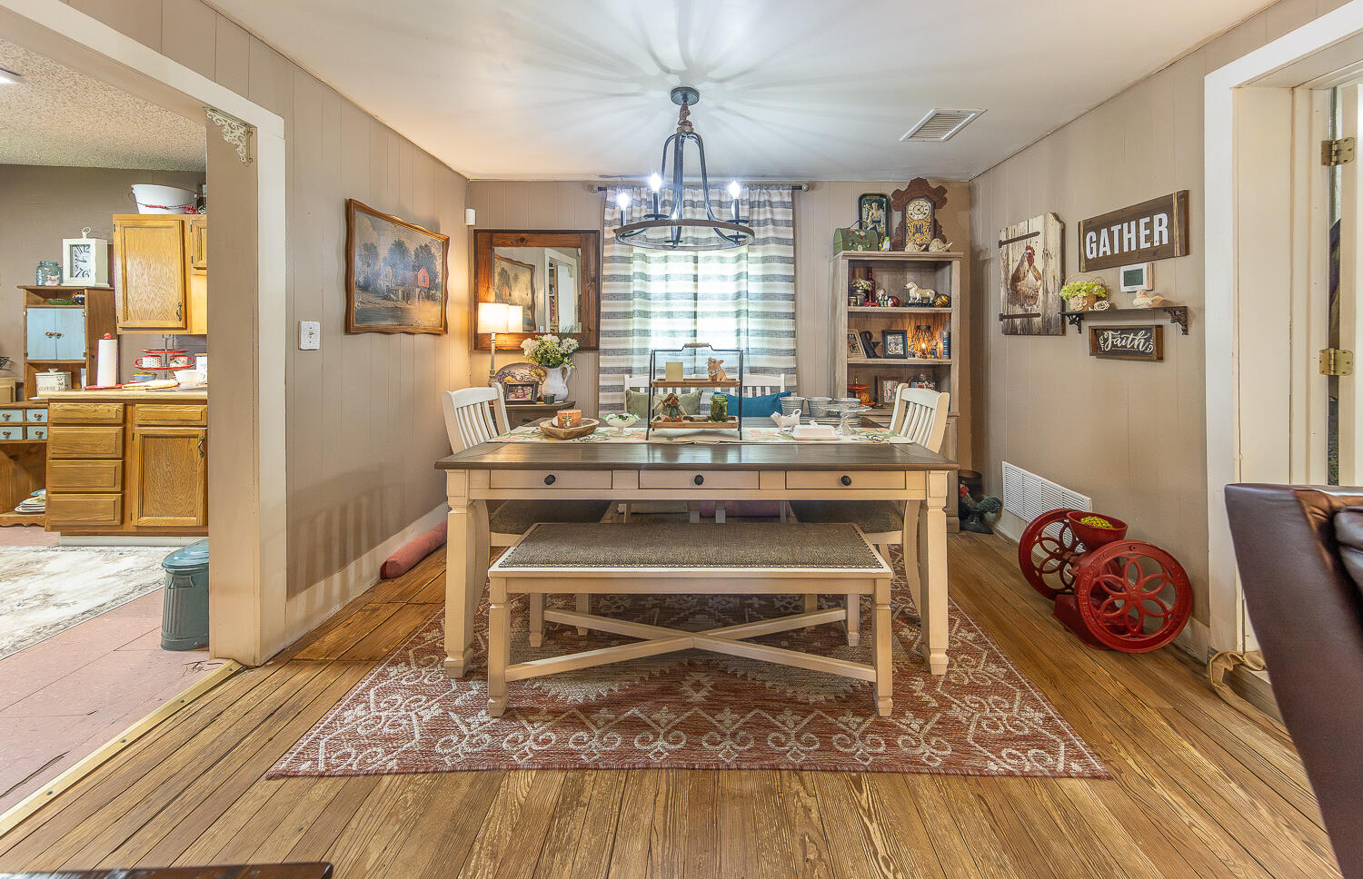450 South 12th Street Slaton, TX 79364 - Photo 6 of 26 a living room with a couch and a table