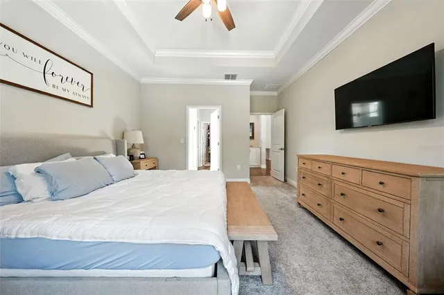 a spacious bathroom with a sink and a mirror