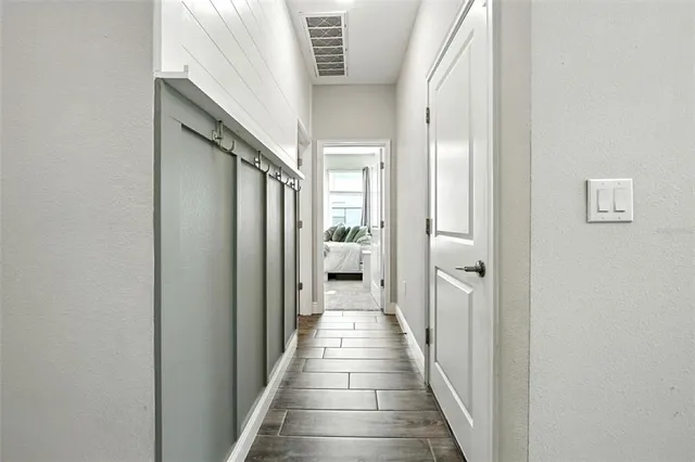 a bathroom with a toilet and bathtub