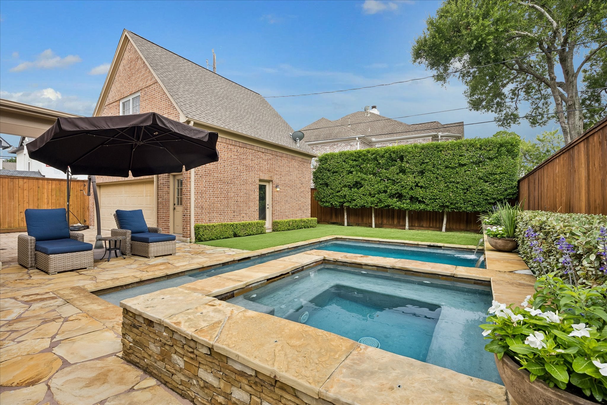 6358 Auden Street Houston, TX 77005 - Photo 44 of 50 a view of a house with swimming pool and sitting area