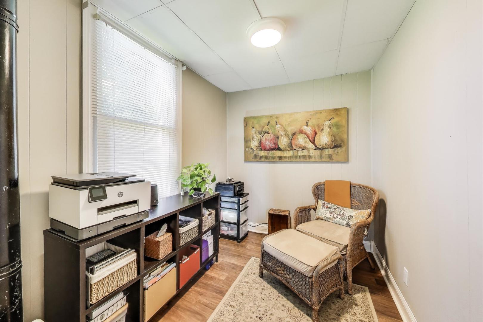 4608 Alden Road Woodstock, IL 60098 - Photo 15 of 42 a living room with furniture and a window