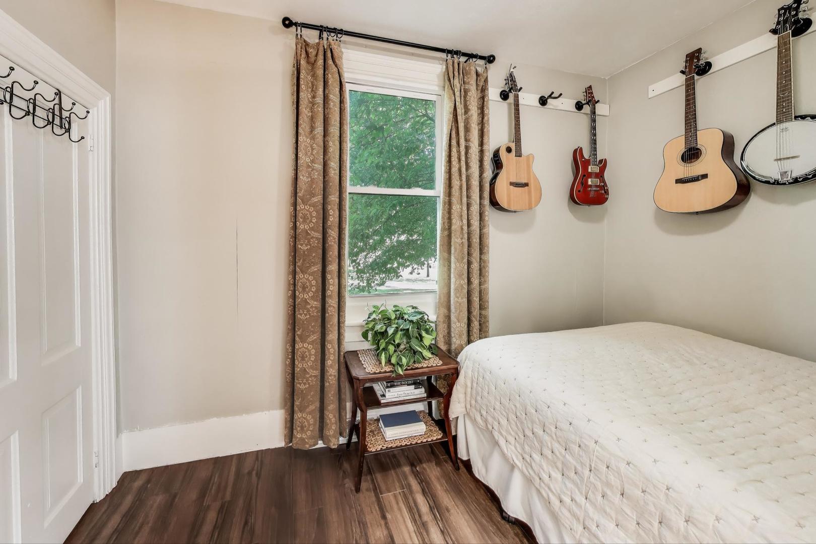 4608 Alden Road Woodstock, IL 60098 - Photo 18 of 42 a bedroom with a bed and a window