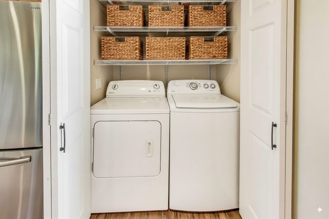a utility room with dryer and washer