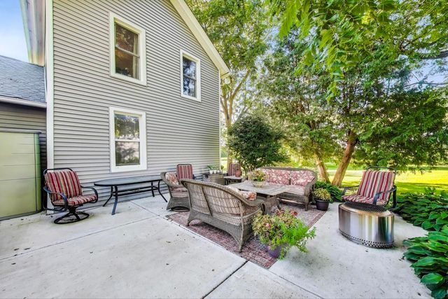 a backyard of a house with seating space