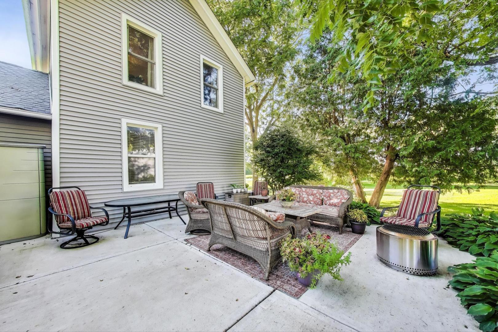 4608 Alden Road Woodstock, IL 60098 - Photo 33 of 42 a backyard of a house with seating space