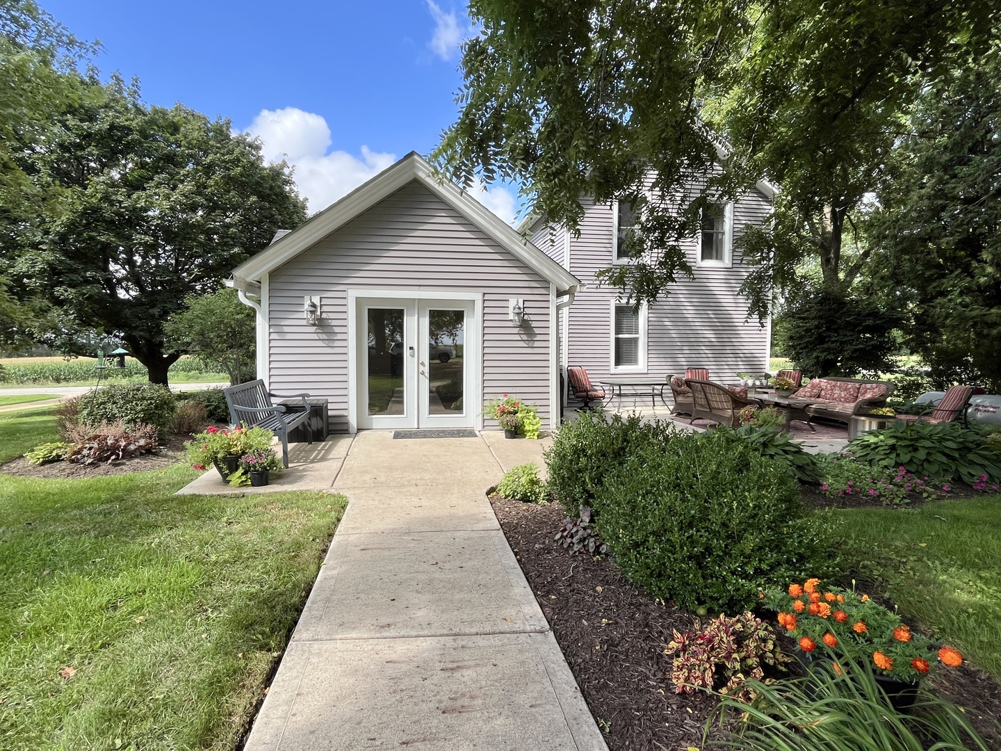 4608 Alden Road Woodstock, IL 60098 - Photo 4 of 42 a front view of a house with a yard