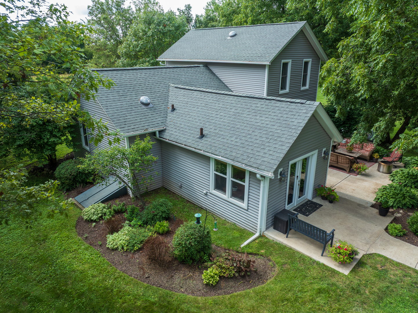 4608 Alden Road Woodstock, IL 60098 - Photo 5 of 42 a aerial view of a house with yard and garage