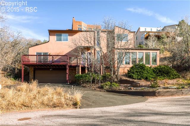 7 Sutherland Road Manitou Springs, CO 80829 - Photo 1 of 6 Low-maintenance stucco exterior - xeriscaped, natural landscaping