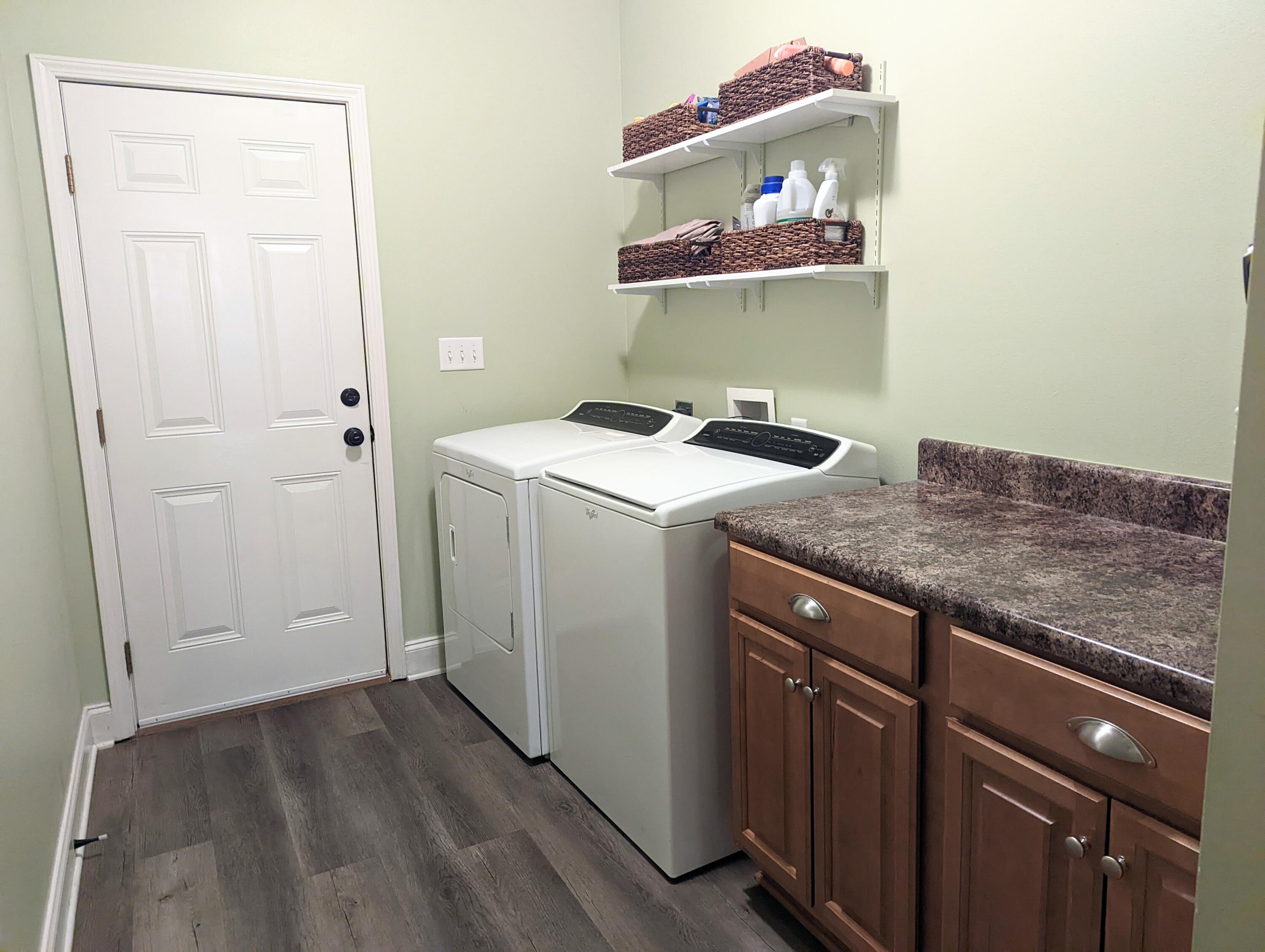 4639 Hermosa Road Crestview, FL 32539 - Photo 15 of 18 a kitchen with a stove and cabinets