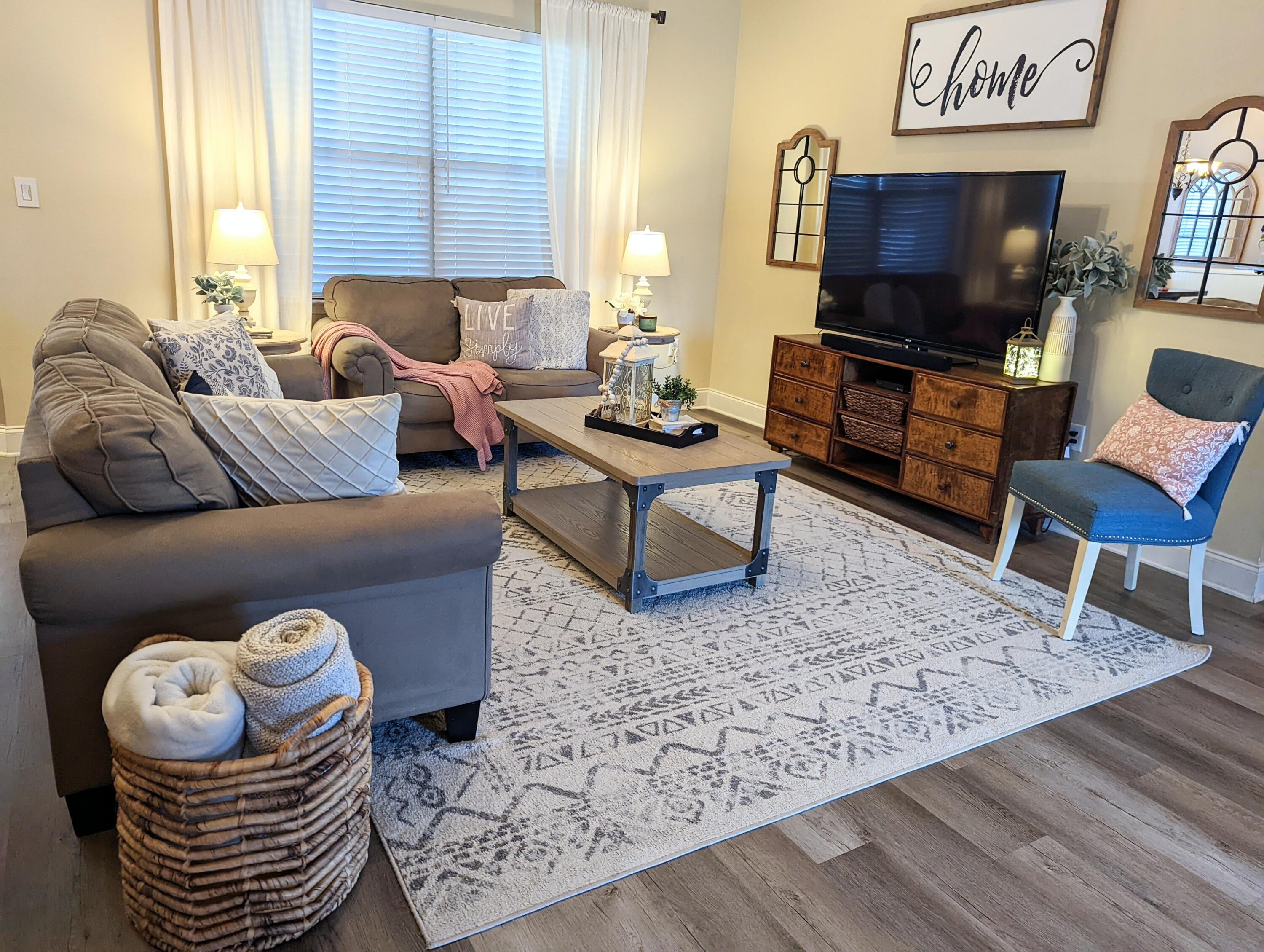 4639 Hermosa Road Crestview, FL 32539 - Photo 3 of 18 a living room with furniture and a flat screen tv