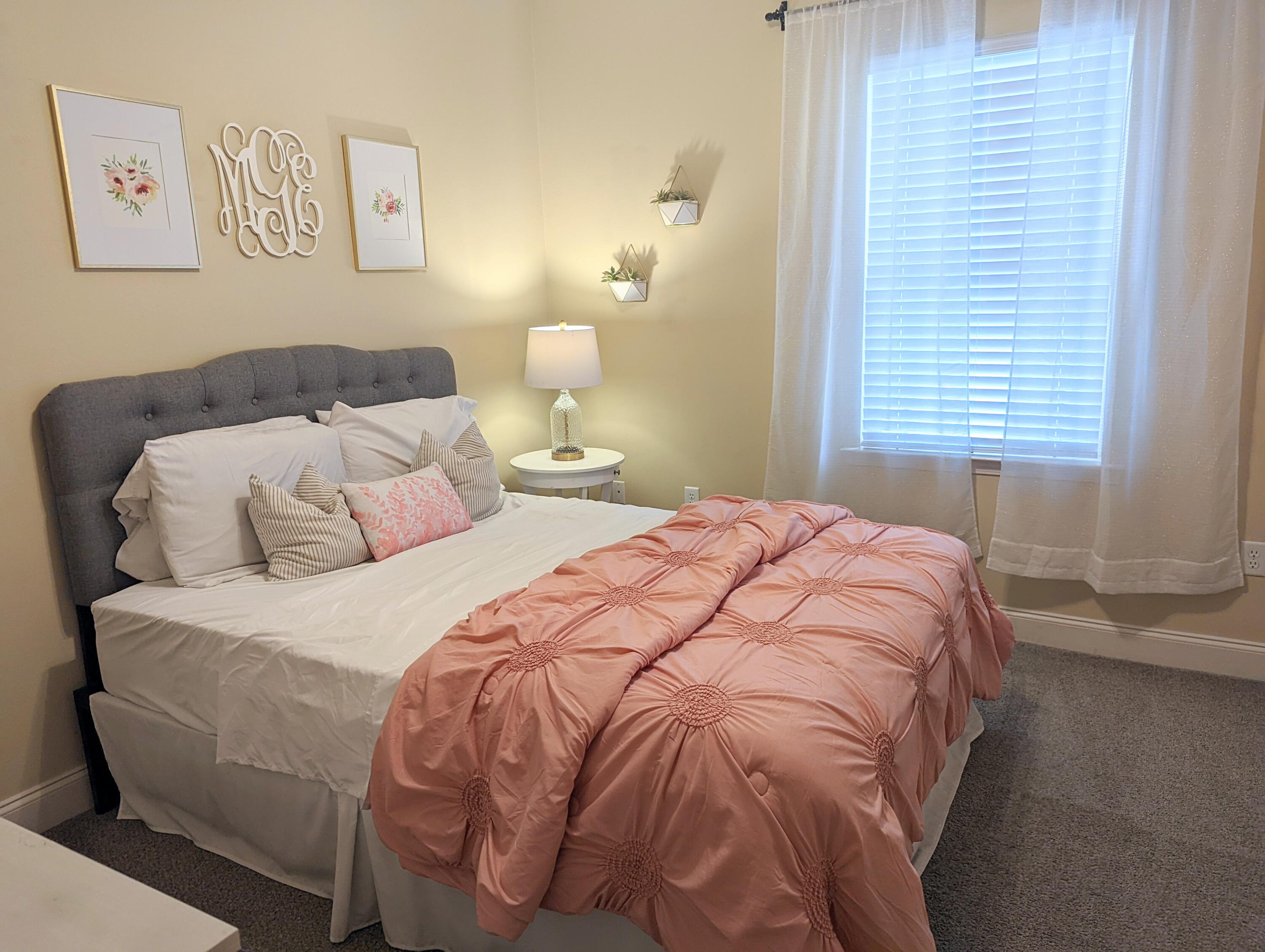 4639 Hermosa Road Crestview, FL 32539 - Photo 10 of 18 a bedroom with a bed and a window
