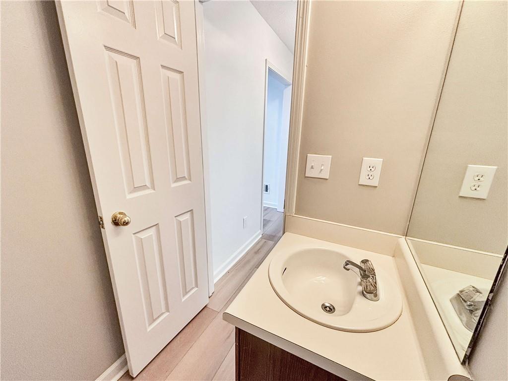 5907 Brookside Drive Southeast Mableton, GA 30126 - Photo 15 of 35 a bathroom with a sink and a mirror