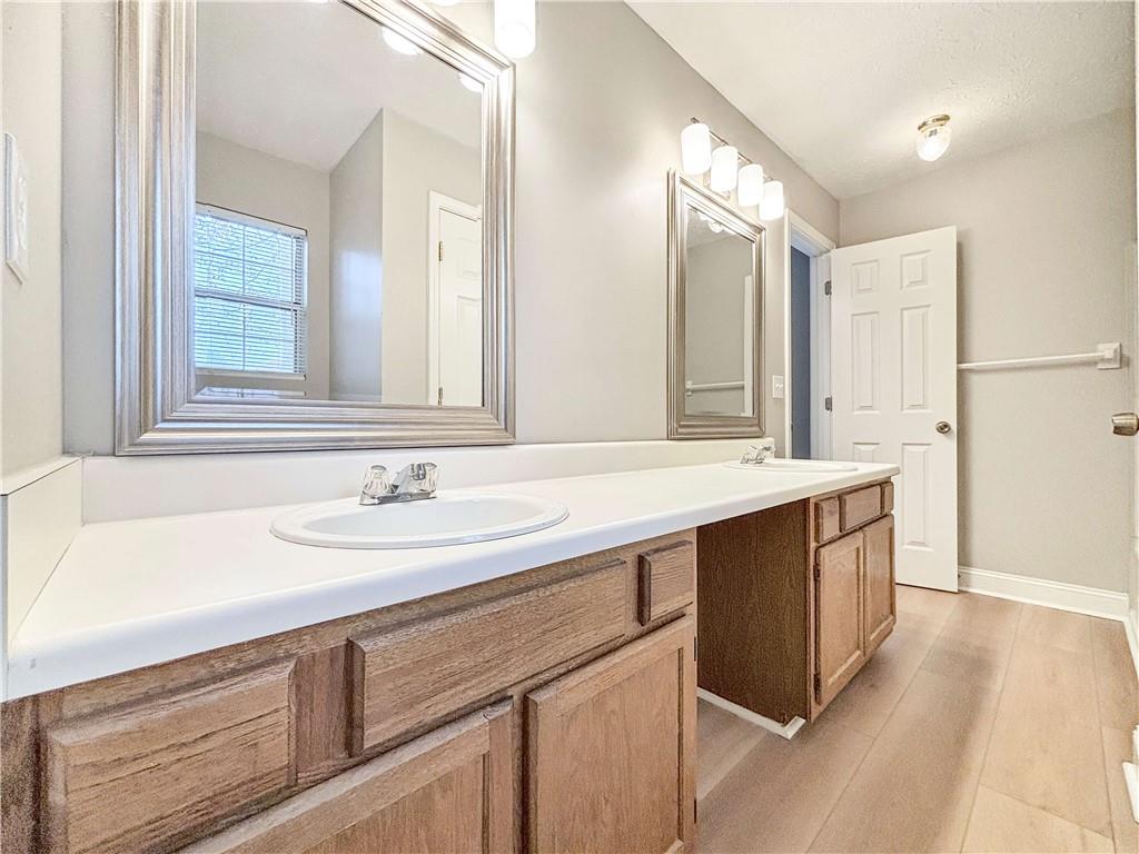 5907 Brookside Drive Southeast Mableton, GA 30126 - Photo 23 of 35 a bathroom with a sink and a mirror