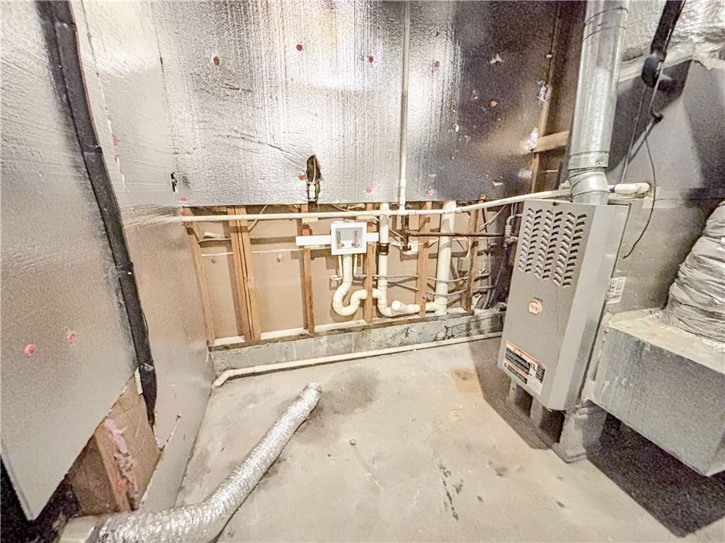 5907 Brookside Drive Southeast Mableton, GA 30126 - Photo 30 of 35 a close view of a sink a stove a washer and dryer