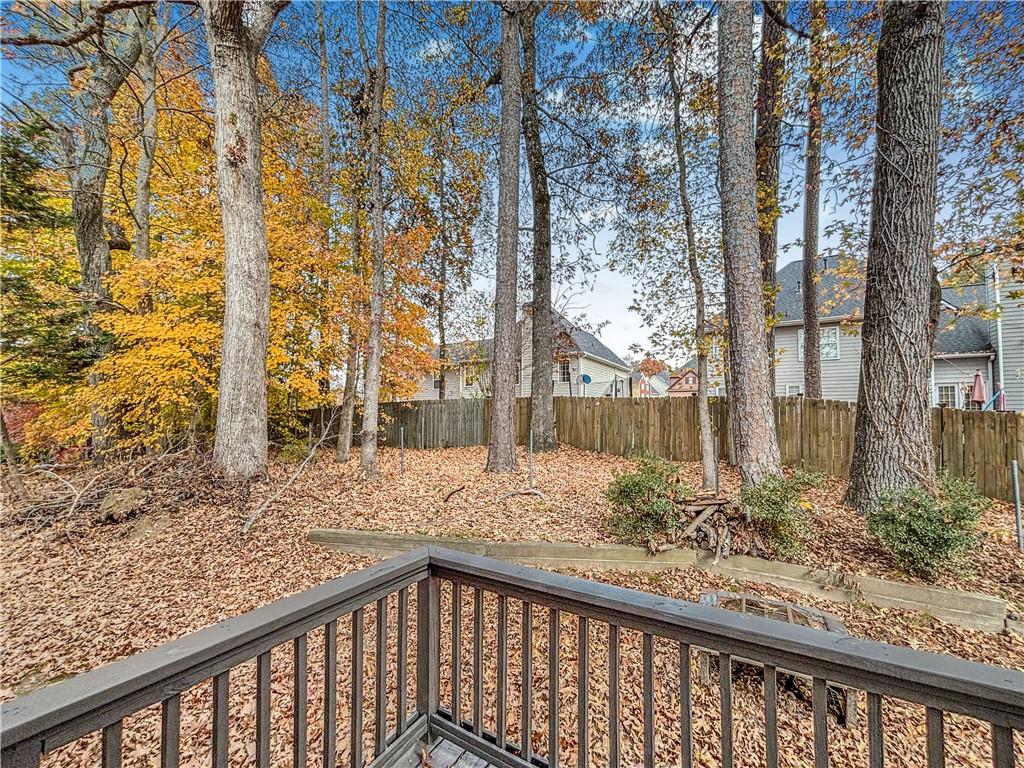 5907 Brookside Drive Southeast Mableton, GA 30126 - Photo 34 of 35 a view of a backyard with a large tree