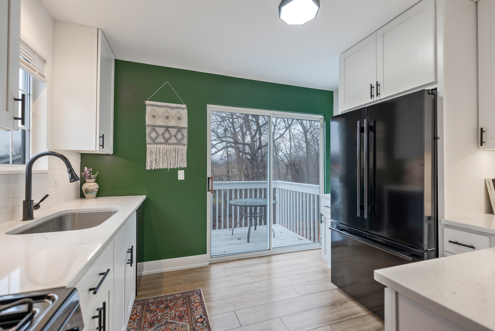 77 Pine Circle Cary, IL 60013 - Photo 4 of 13 a bathroom with a sink a mirror and a bathtub