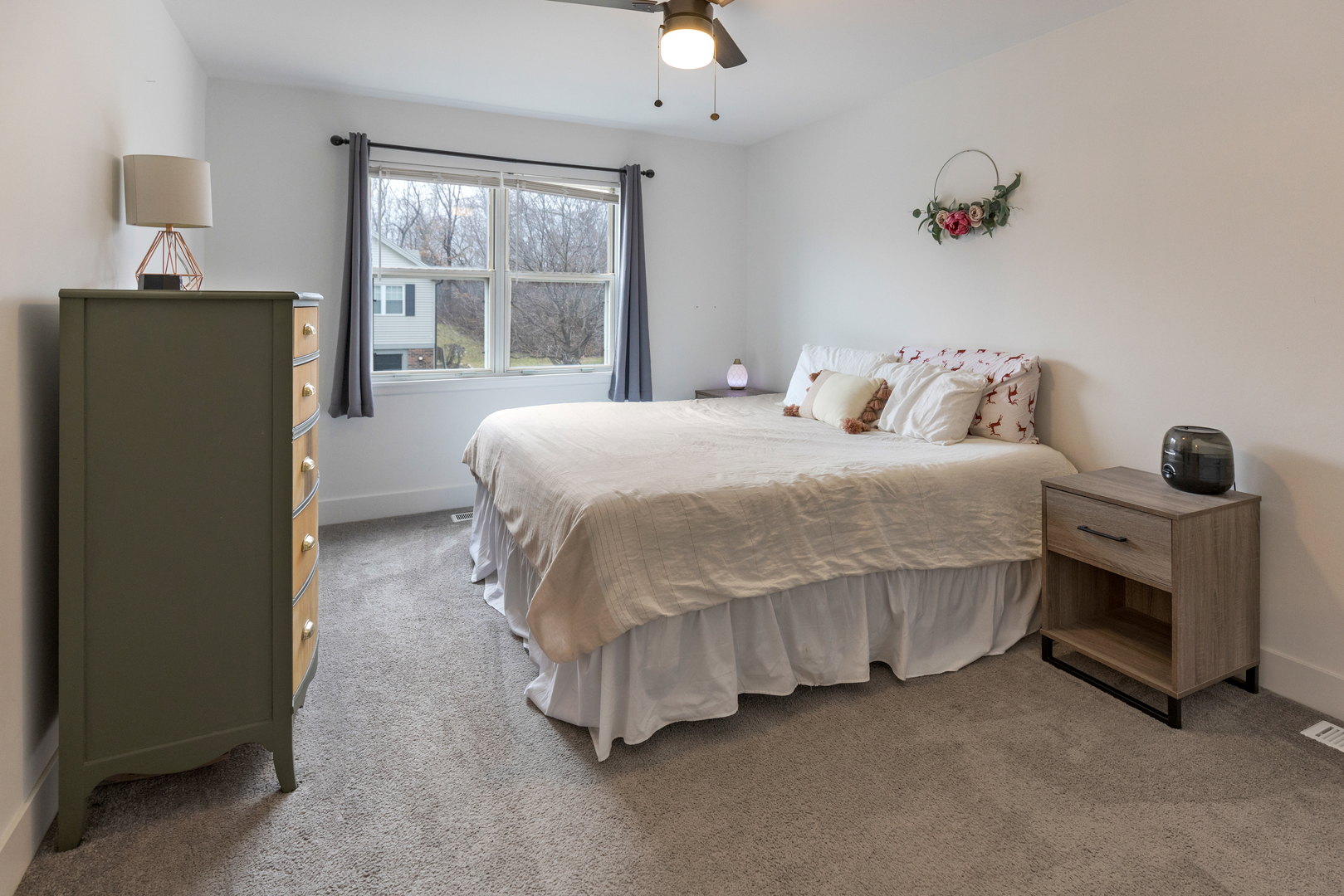 77 Pine Circle Cary, IL 60013 - Photo 7 of 13 a bedroom with a bed and a window