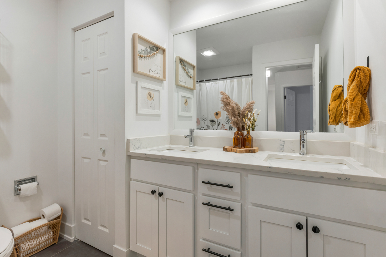 77 Pine Circle Cary, IL 60013 - Photo 8 of 13 a bathroom with a double vanity sink and a mirror