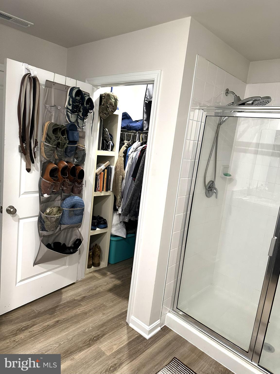 490 Mossy Grove Lane La Plata, MD 20646 - Photo 12 of 20 a view of walk in closet with clothes and shoes