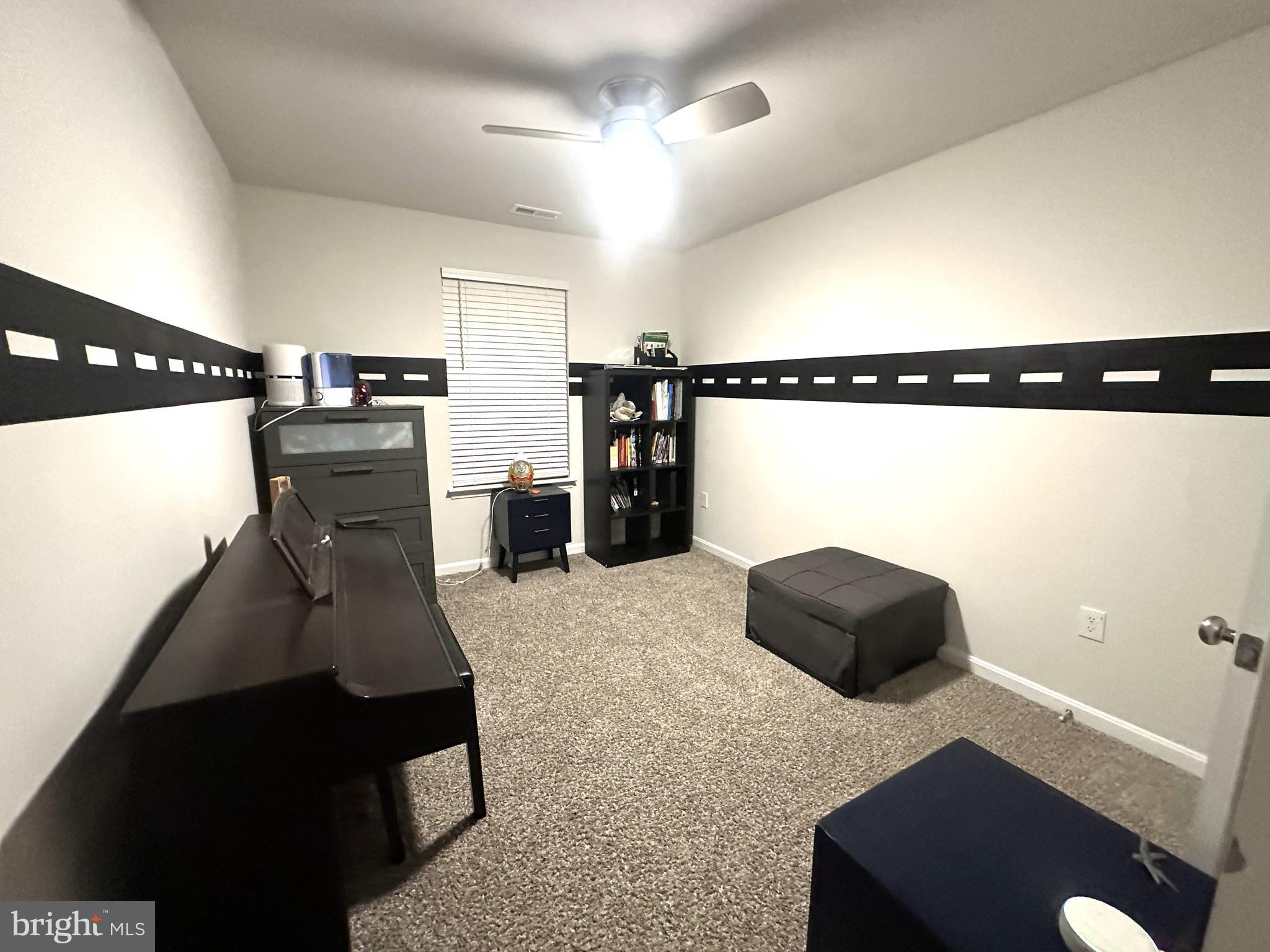 490 Mossy Grove Lane La Plata, MD 20646 - Photo 17 of 20 a kitchen with a refrigerator and a stove