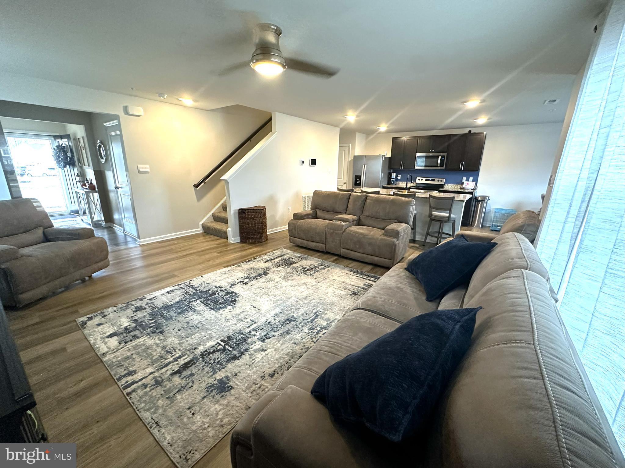 490 Mossy Grove Lane La Plata, MD 20646 - Photo 4 of 20 a living room with furniture and kitchen view