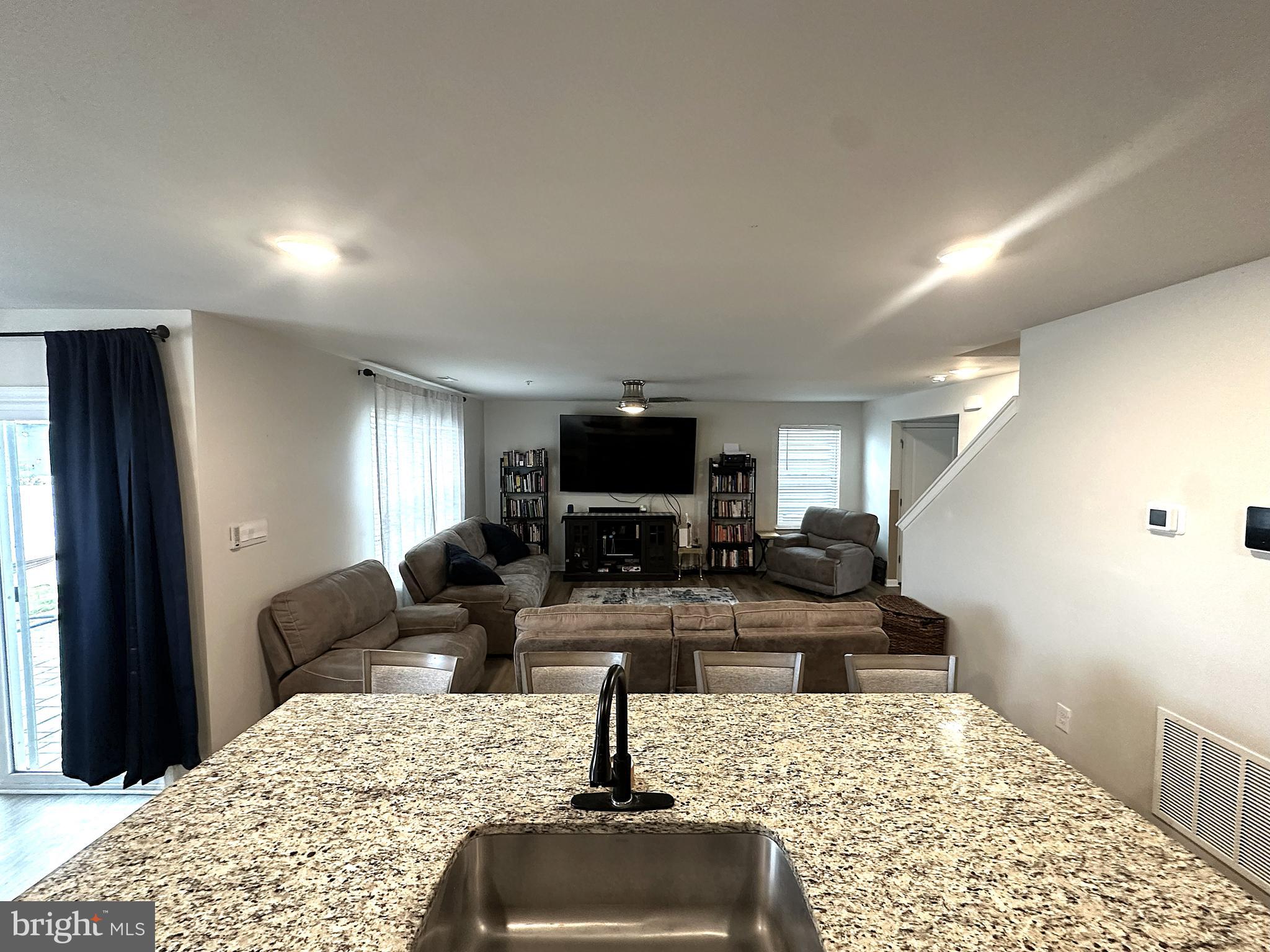 490 Mossy Grove Lane La Plata, MD 20646 - Photo 5 of 20 a living room with furniture and a flat screen tv