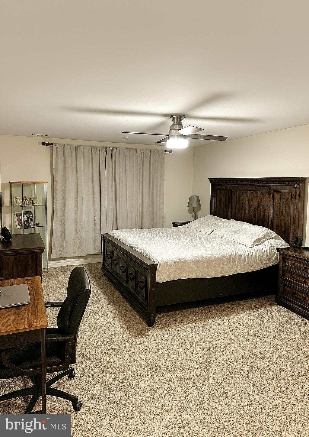 490 Mossy Grove Lane La Plata, MD 20646 - Photo 8 of 20 a bedroom with a bed and a desk