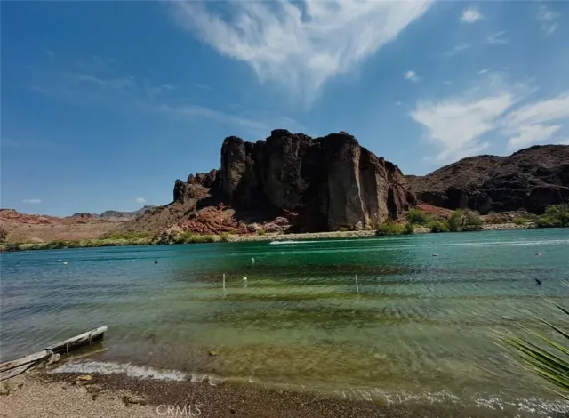 a view of a town with large trees