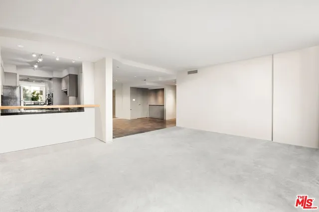 a view of a kitchen with a sink