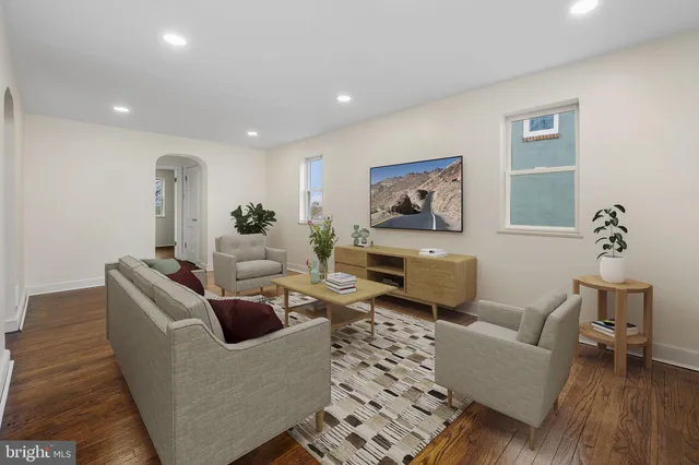 a living room with furniture and a couch