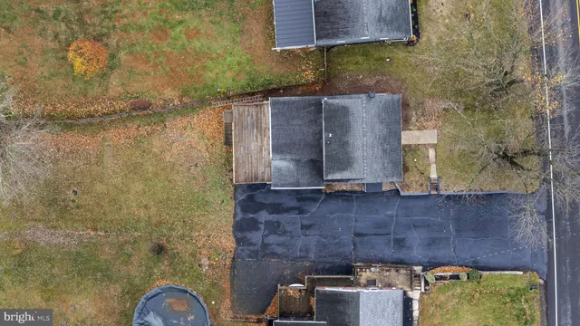 a stone house with a sink