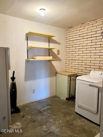 a view of empty room with windows