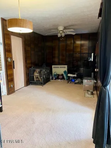 a kitchen with stainless steel appliances a stove a microwave and a sink