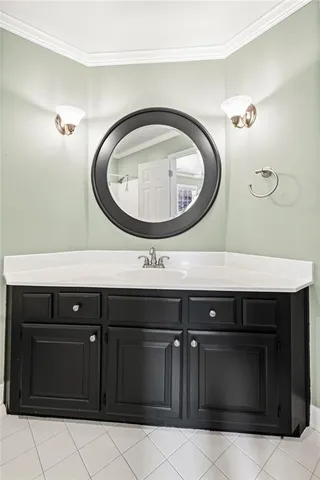 a view of a livingroom with a flat screen tv and fan