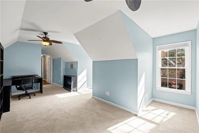 a view of a house with a roof deck
