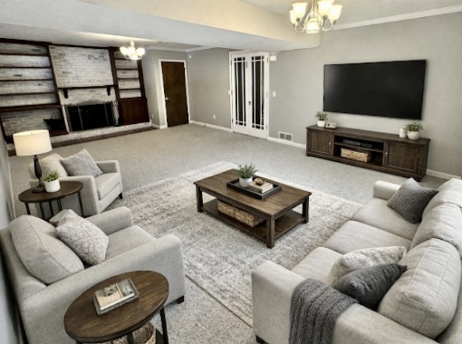 117 Colchester Drive Normal, IL 61761 - Photo 14 of 32 a living room with furniture a flat screen tv and a large window