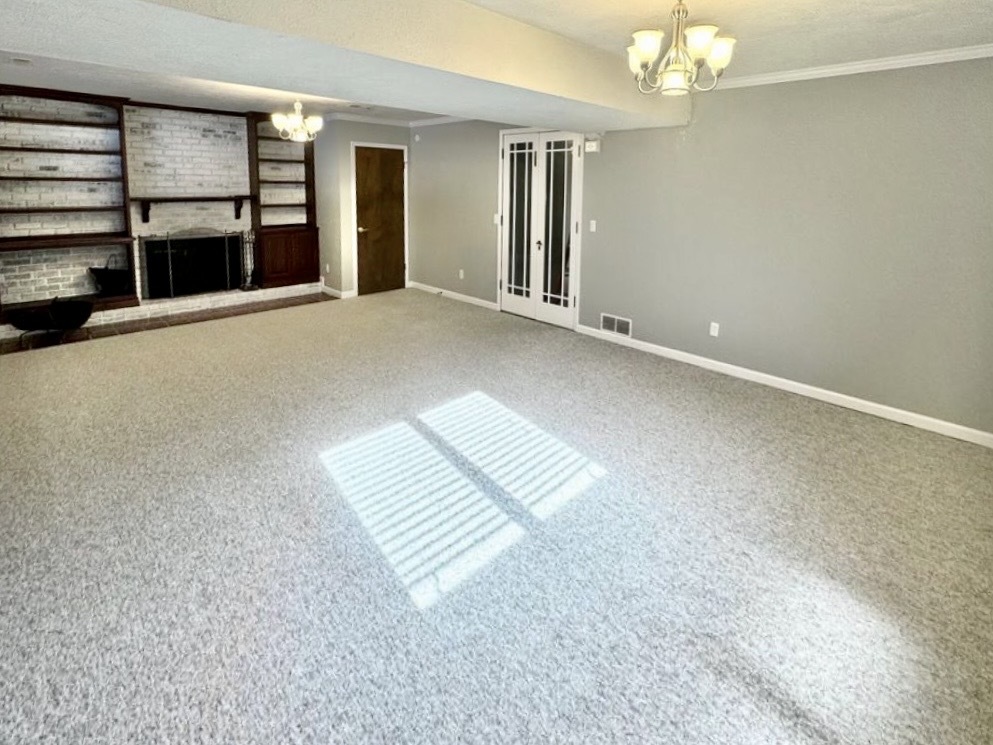 117 Colchester Drive Normal, IL 61761 - Photo 15 of 32 a view of an empty room with a window