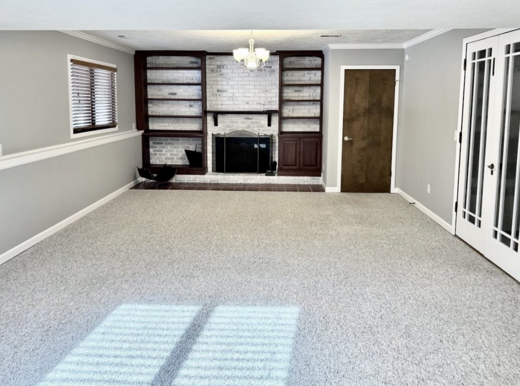 117 Colchester Drive Normal, IL 61761 - Photo 16 of 32 an empty room with windows and closet