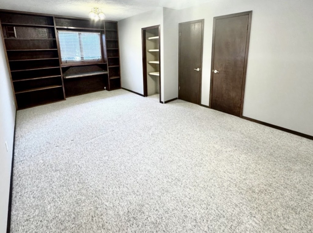 117 Colchester Drive Normal, IL 61761 - Photo 18 of 32 a view of an empty room with an empty space