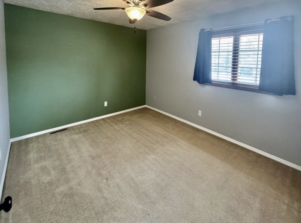 117 Colchester Drive Normal, IL 61761 - Photo 25 of 32 an empty room with a window