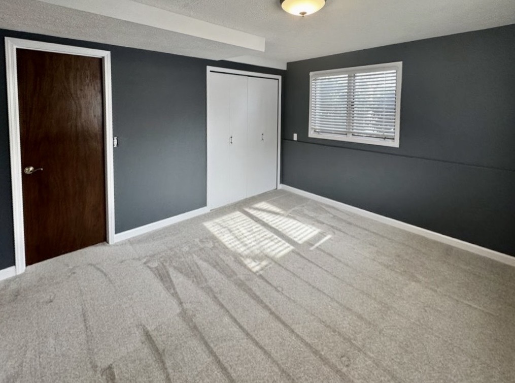 117 Colchester Drive Normal, IL 61761 - Photo 31 of 32 a bedroom with a bed and a window