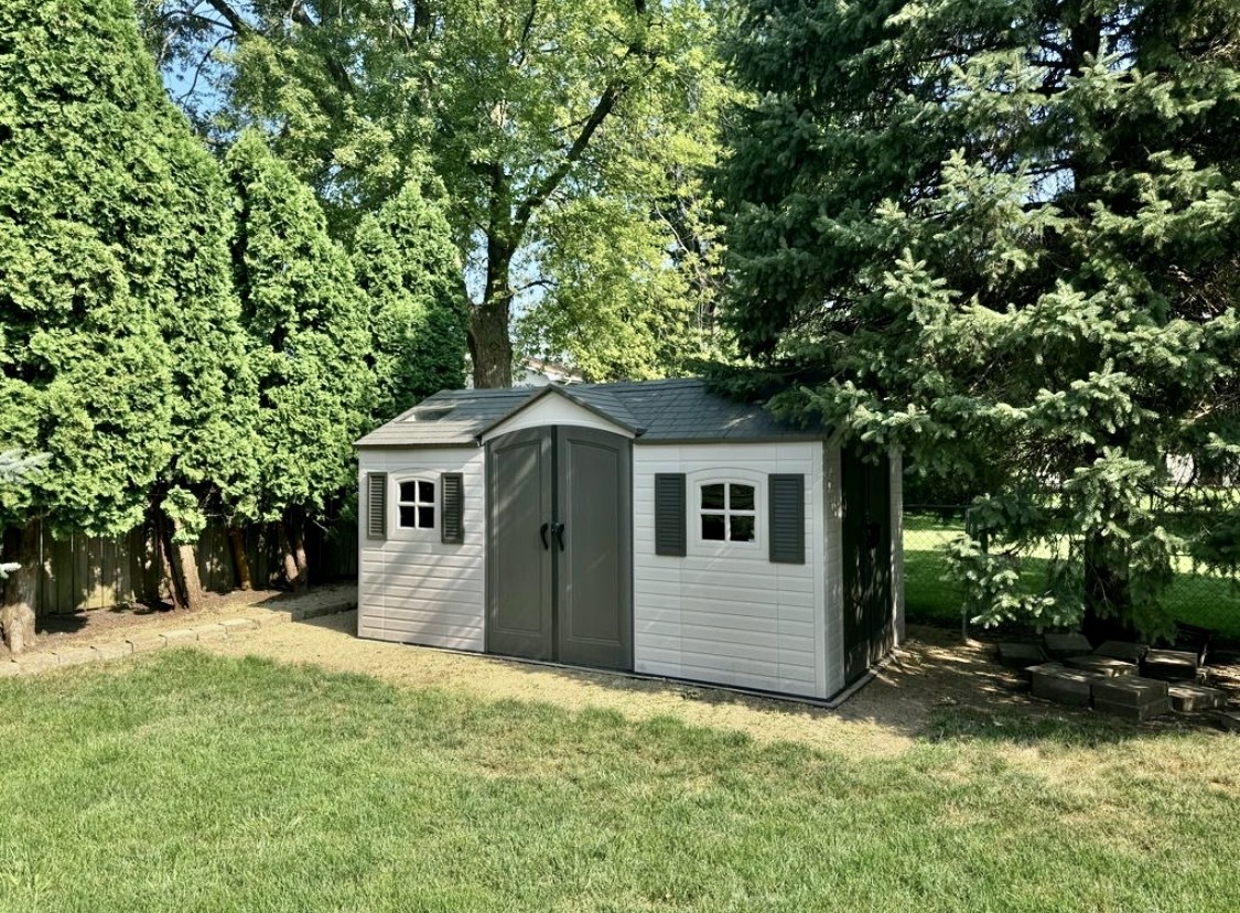 117 Colchester Drive Normal, IL 61761 - Photo 6 of 32 a front view of a house with a yard