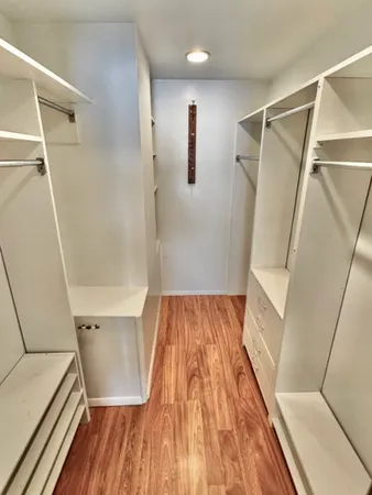 a view of wooden floor in a bathroom