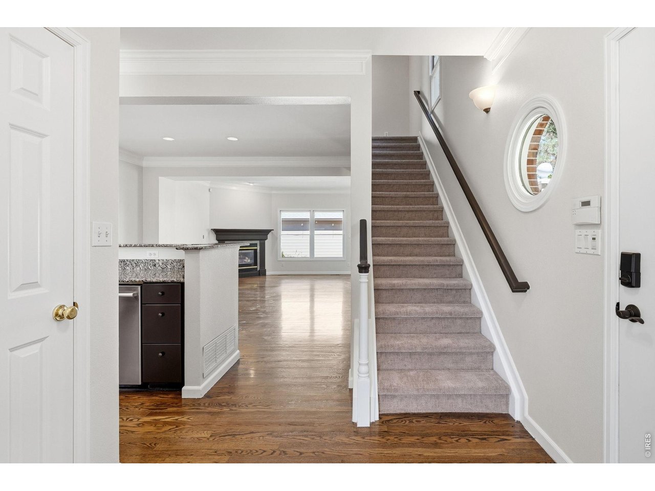 944 Ivanhoe Street Denver, CO 80220 - Photo 11 of 47 a view of entryway and hall with wooden floor