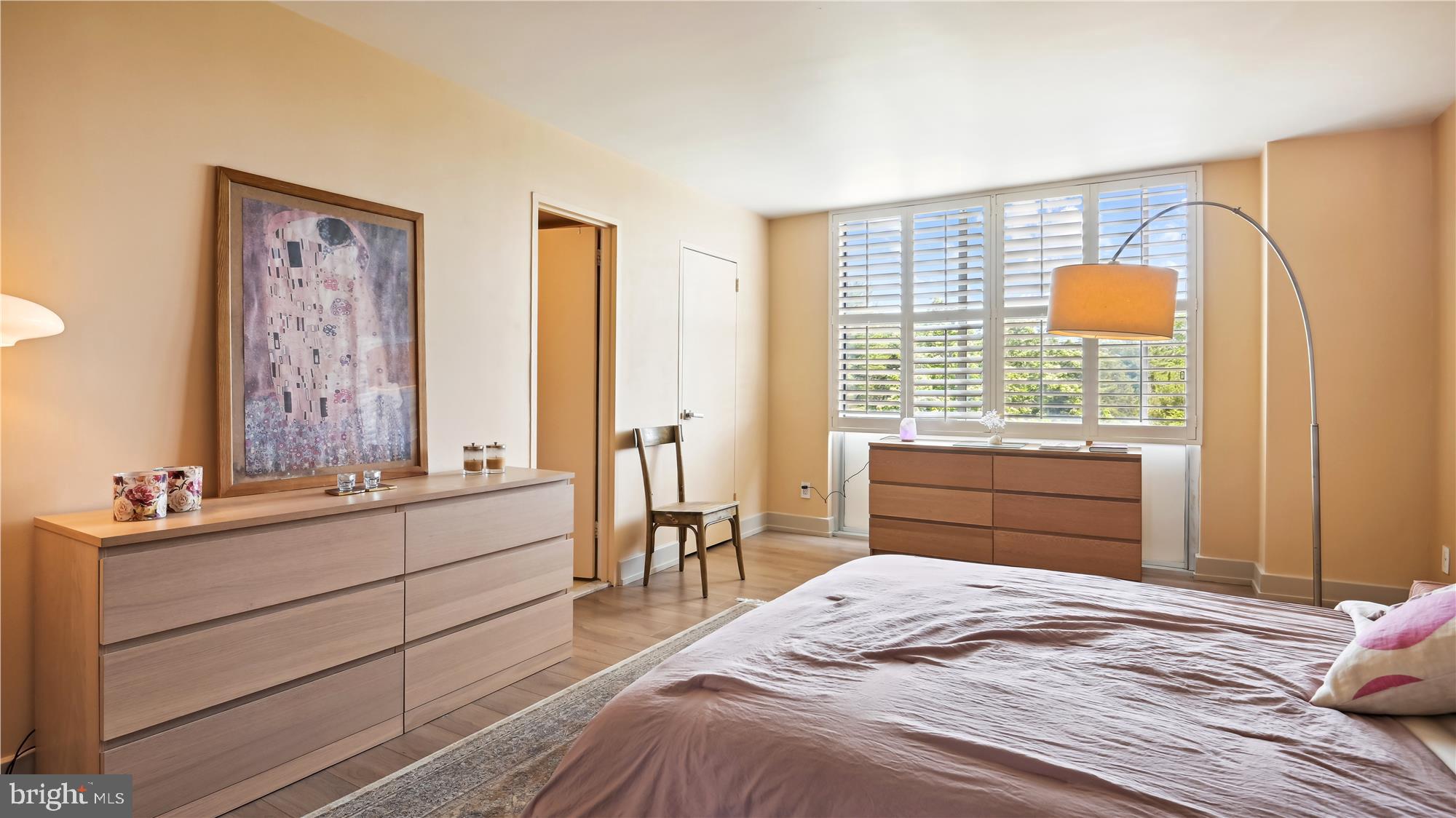 5101 River Road, Unit 602 Bethesda, MD 20816 - Photo 12 of 35 a bedroom with a bed and a window