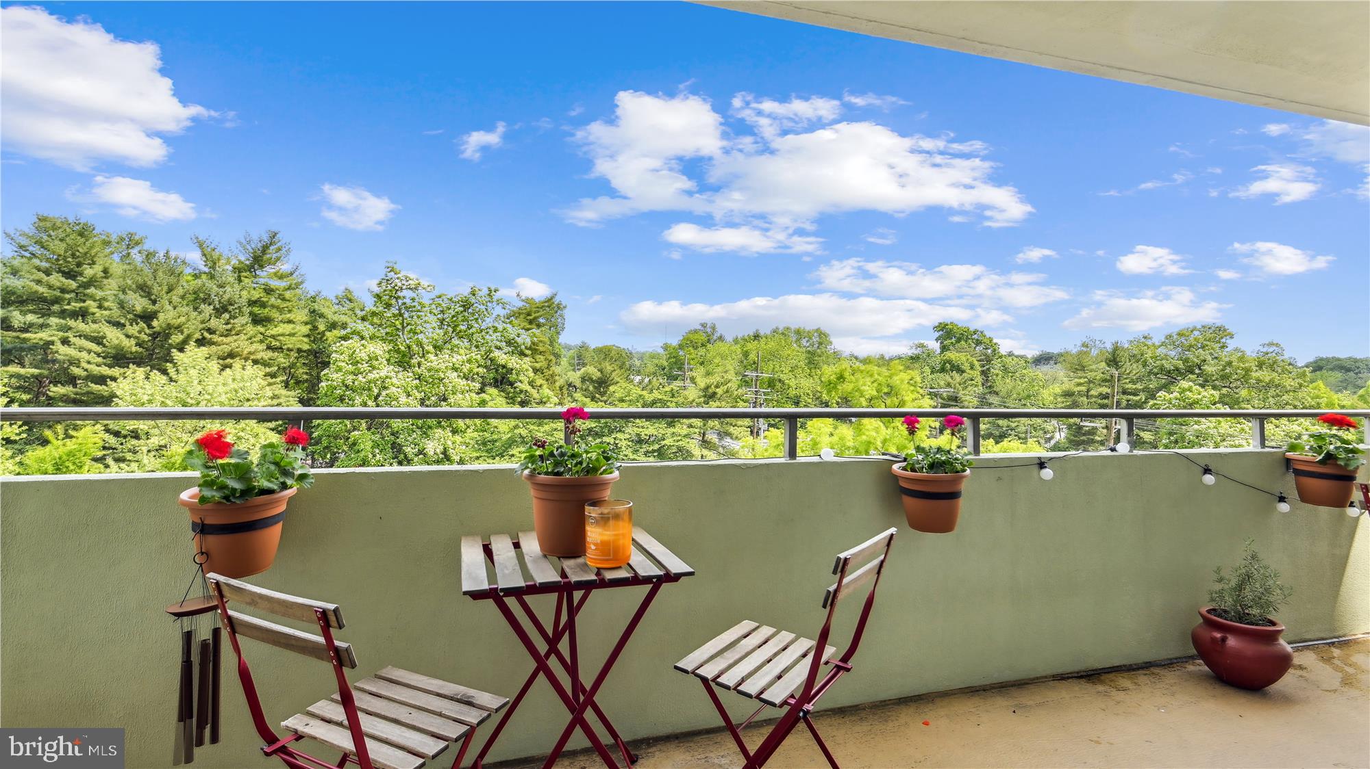 5101 River Road, Unit 602 Bethesda, MD 20816 - Photo 17 of 35 a view of a chair and table in the terrace