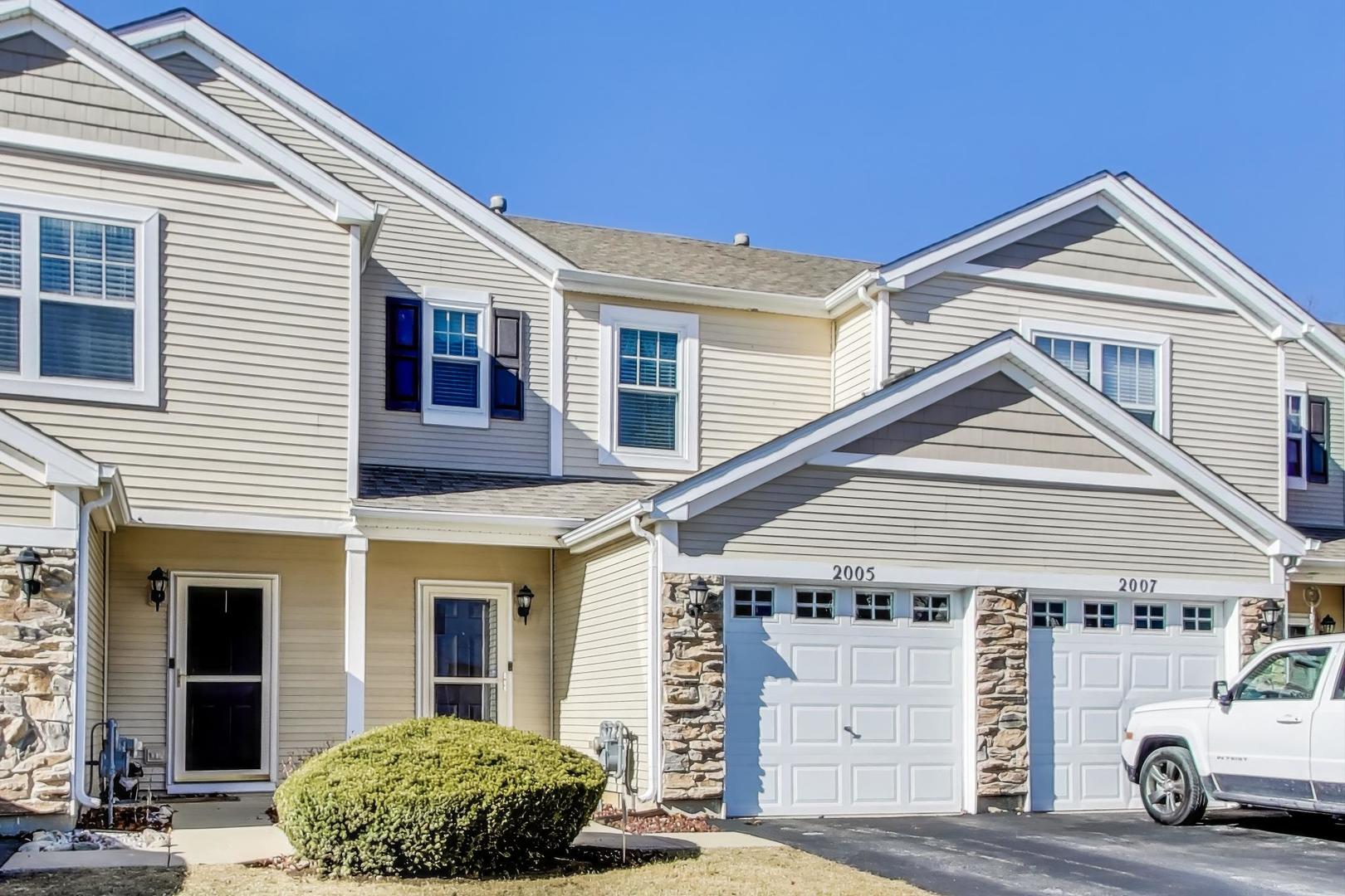 2005 Limestone Lane Carpentersville, IL 60110 - Photo 1 of 23 a view of a white house