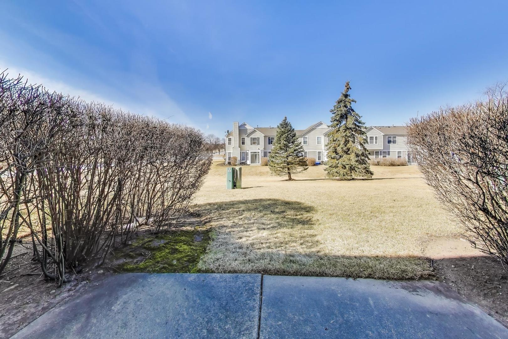 2005 Limestone Lane Carpentersville, IL 60110 - Photo 18 of 23 a view of a yard with wooden fence