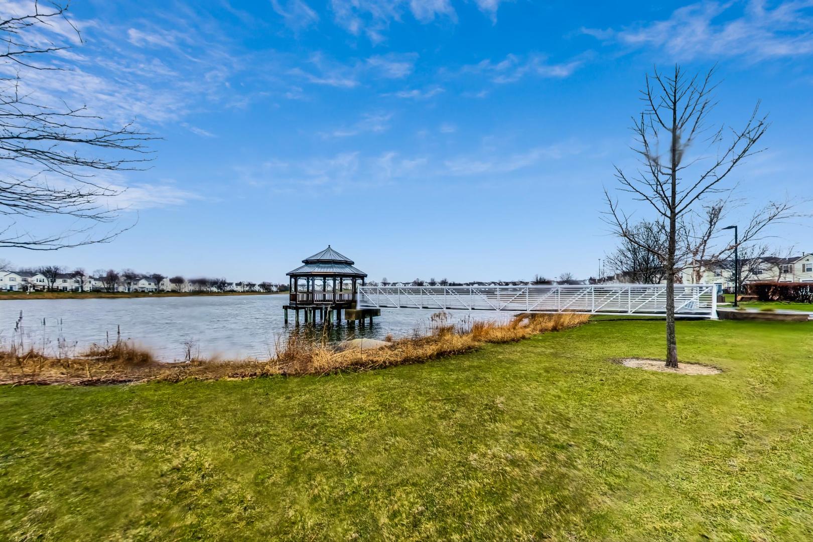 2005 Limestone Lane Carpentersville, IL 60110 - Photo 21 of 23 a swimming pool with lake view
